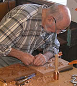 student practicing wood carving technique