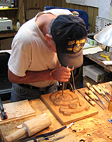 wood carving student working on project