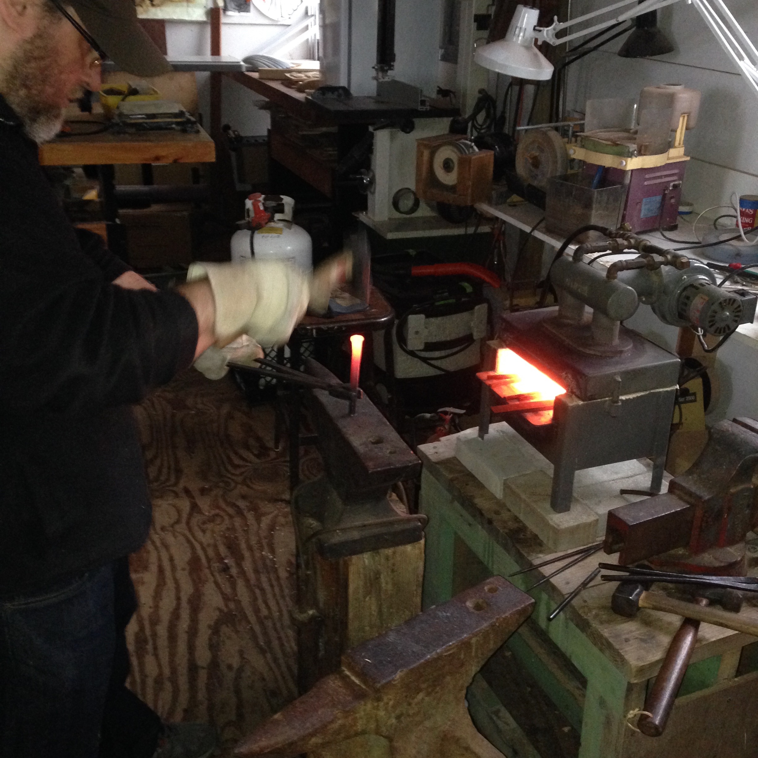Shaping a carving tool in a propane forge
