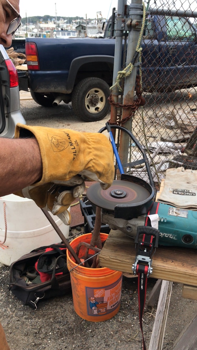 Grinding to shape a forged tool blade